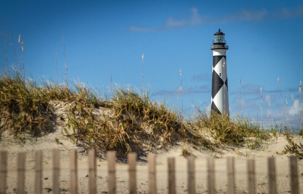 Black and white lighthouse on Cape Lookout Seashore in Outer Banks North Carolina