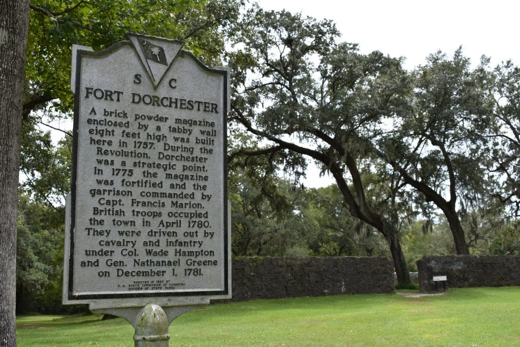 tabby fort with live oak trees and spanish moss with historical marker in foreground