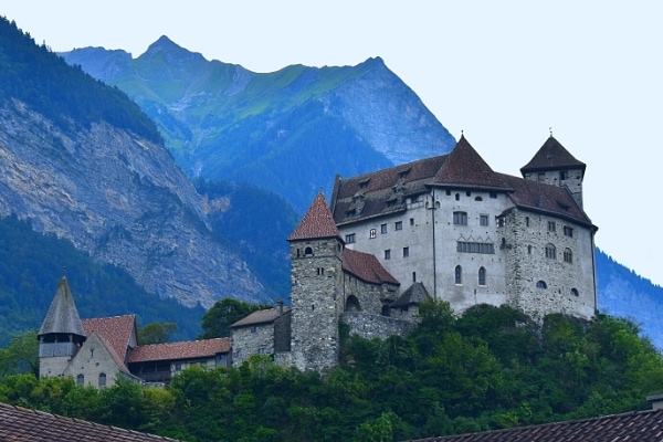 Gutenberg Castle sits on a hill above town but is towered over by the mountains in the background