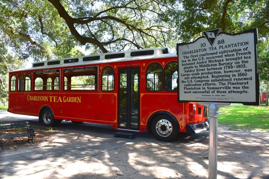 Red Charleston Tea Garden Trolley bus with historical marker