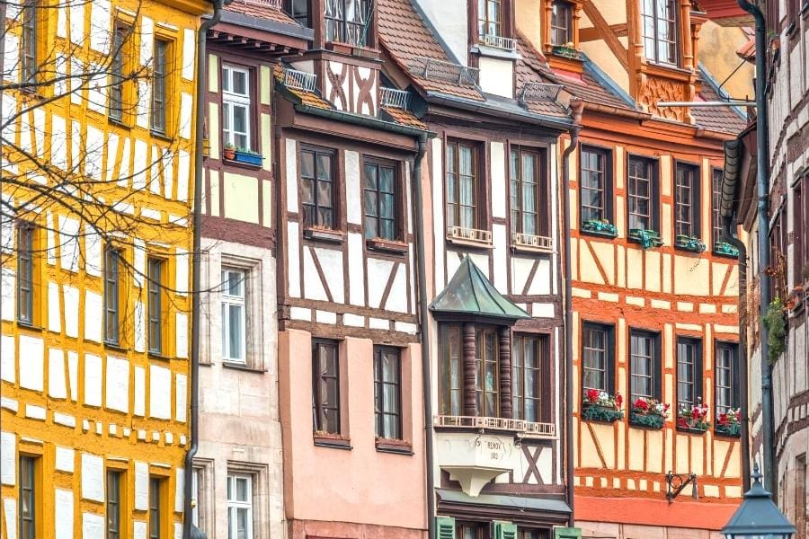 Colorful facades of half-timbered homes on Weisgerbergasse in Nuremberg Germany