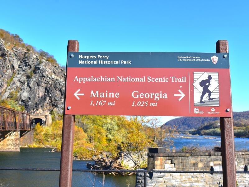 A sign near The Point in Harpers Ferry indicates the almost halfway point between Maine and Georgia of the Appalachian National Scenic Trail