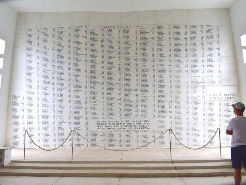 The white marble wall of names in memory of those that gave their lives on the USS Arizona