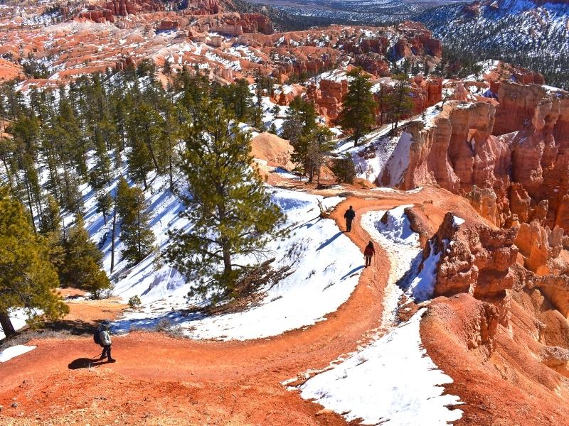 Hikers descend down the steep entrance of the Queen's Garden Trail in Bryce Canyon National Park