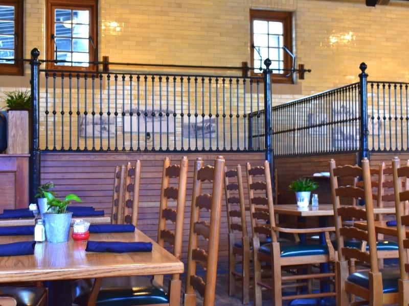 Shiny tile walls and wood and iron horse stalls have been converted into the Stable Cafe Restaurant at Biltmore