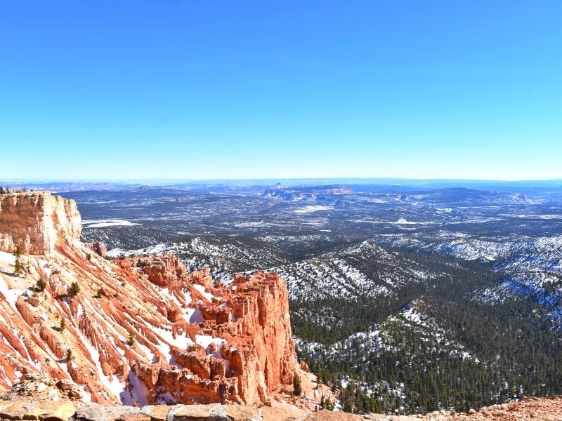 Snowy orange cliffs of Bryce Canyon meet the deep evergreen forests of the Grand Staircase