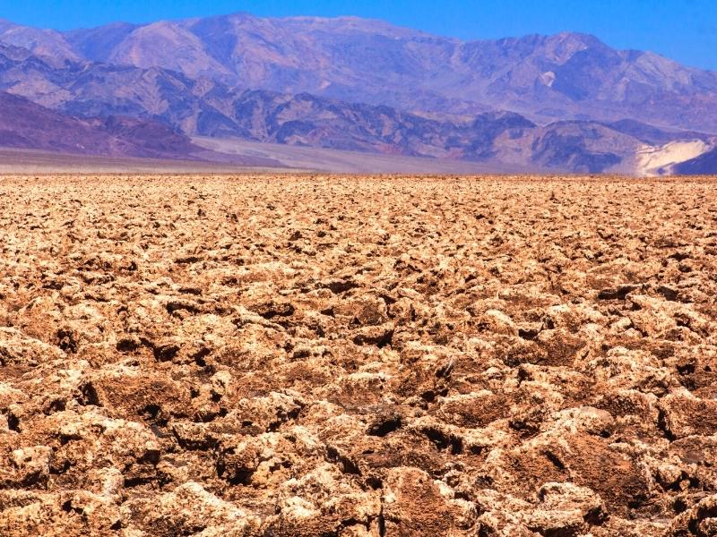 The Devil's Golf Course in Death Valley is rough, sharp rocks and crystals as far as the eye can see on the valley floor