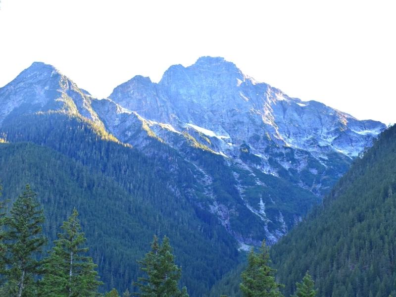 Mountain peaks alight with the last light of the day