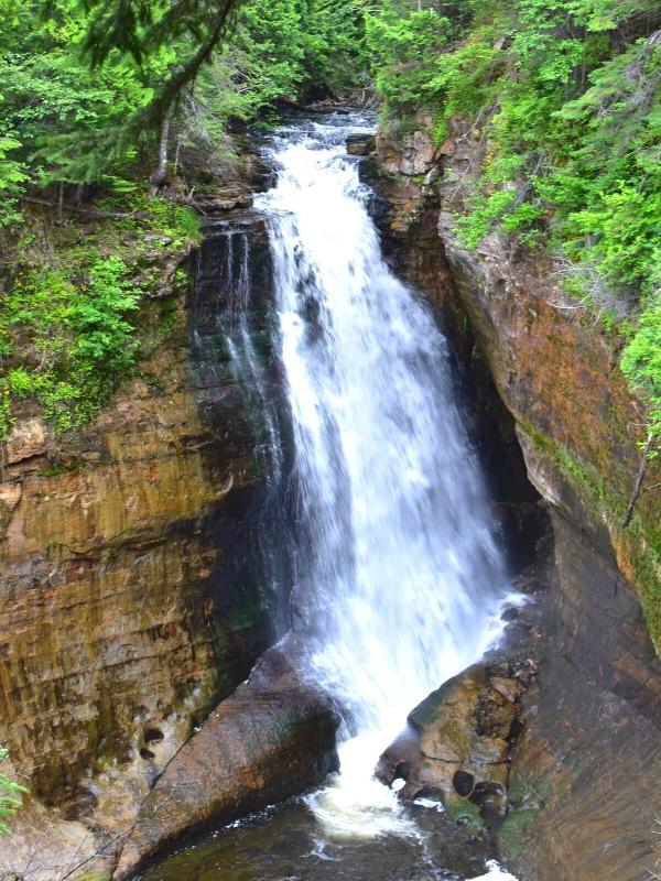 Miners Falls pours over a rock ledge, one of the tallest waterfalls in Pictured Rocks National Lakeshore