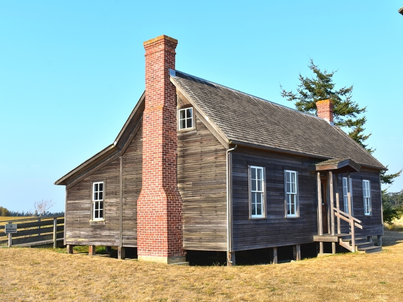 A wooden building circa the 1800s is the Jacob and Sarah Ebey House at Ebeys Landing National Historical Reserve on Whidbey Island