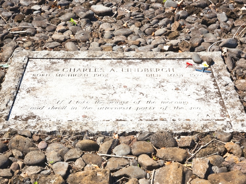 The simple white stone marker of Charles Lindbergh's grave on Maui