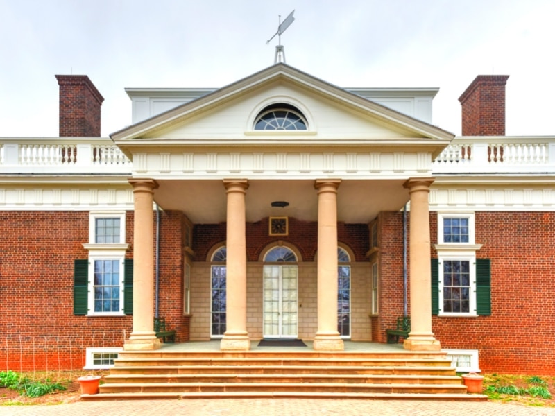 The front entrance of Jefferson's Monticello hides the iconic rotunda in the back.