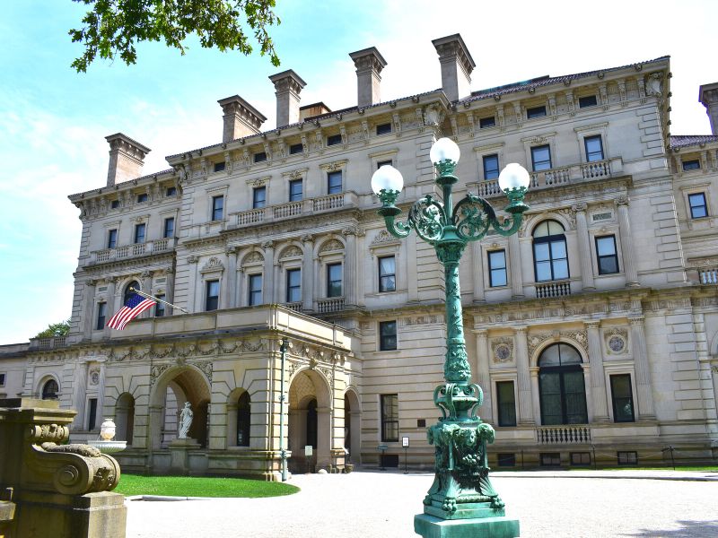 The impressive stone front facade of The Breakers mansion in Newport, RI