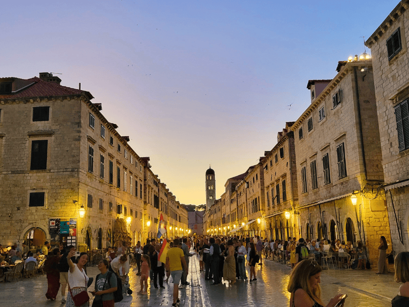 Dubrovnik's main street lit up at dusk