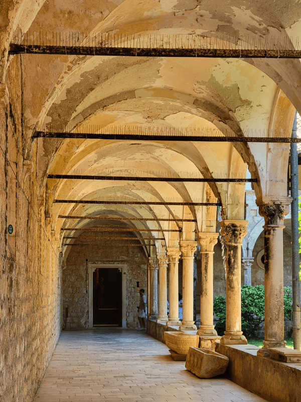 Columned arched walkway in the Benedictine Monastery on Lokrum Island