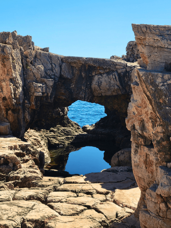 A natural stone sea arch at Hidden Cove on Lokrum Island